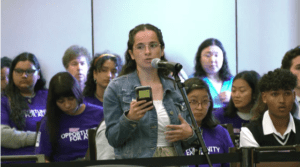 Katie Wagman delivers a comment during the UC Regents meeting